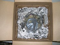 Wadded newspaper surrounding carburetor